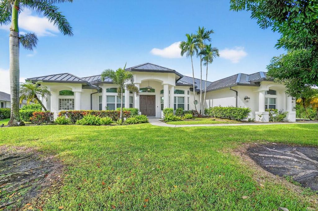 Photo of 15830 Meadow Wood Drive, Wellington, FL 33414 (MLS # R11125260)