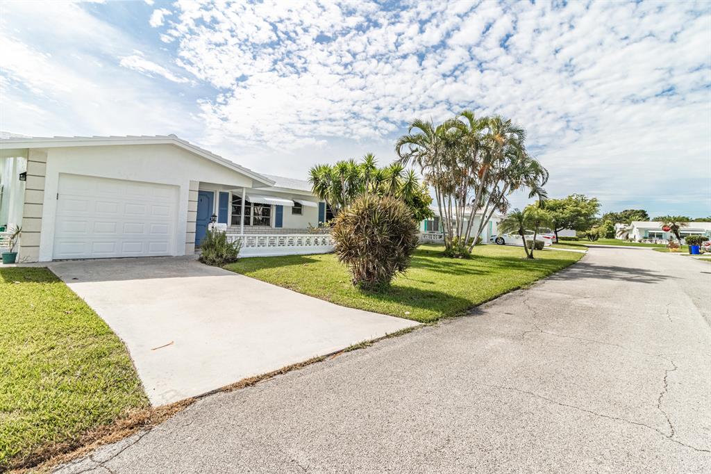 Quaint home in Leisureville, close to the clubhouse and pool. 18 Hole golf course and many available amenities are included. Screened in patio, freshly painted and new baseboards. Brand new carpet throughout living spaces. Washer/Dryer and 1 car garage. Large front porch.