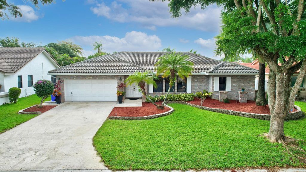 Photo of 5147 NW 59 Way, Coral Springs, FL 33067 (MLS # R10899544)