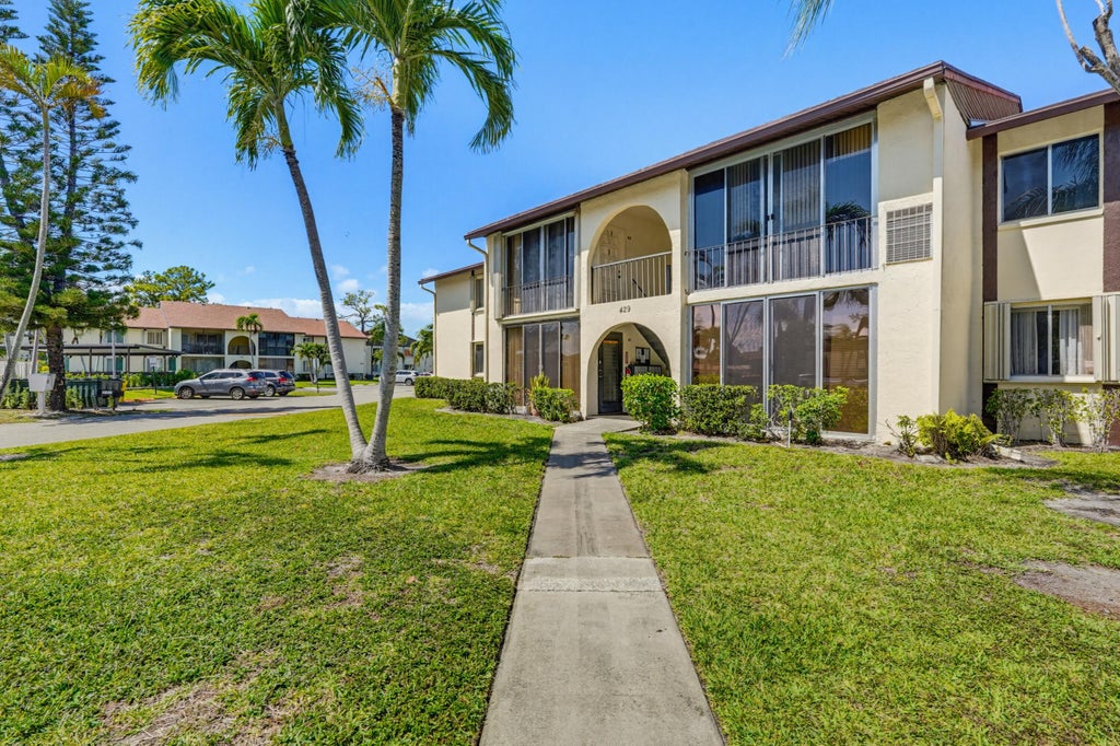 Photo of 5760 PINE WOOD Drive #D-1, Greenacres, FL 33463 (MLS # B26094649)