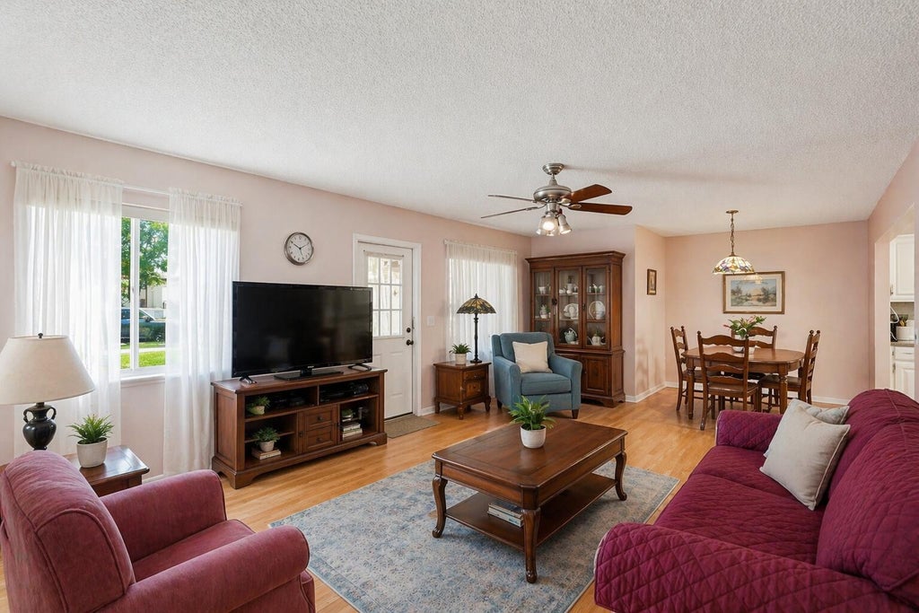 Photo of 5760 PINE WOOD Drive #D-1, Greenacres, FL 33463 (MLS # B26094649)