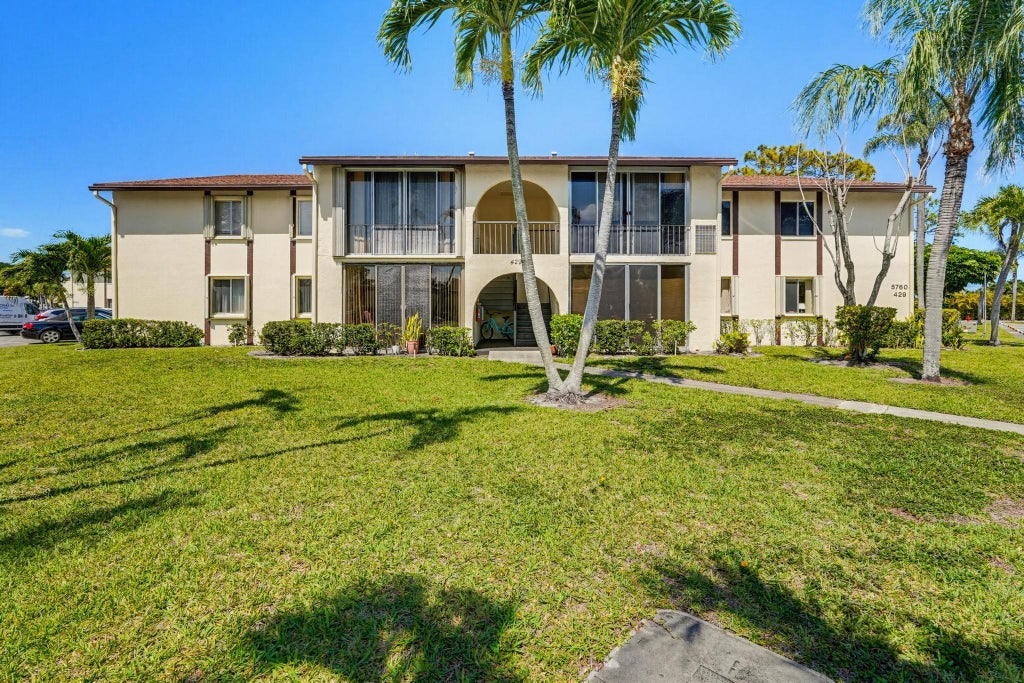 Photo of 5760 PINE WOOD Drive #D-1, Greenacres, FL 33463 (MLS # B26094649)