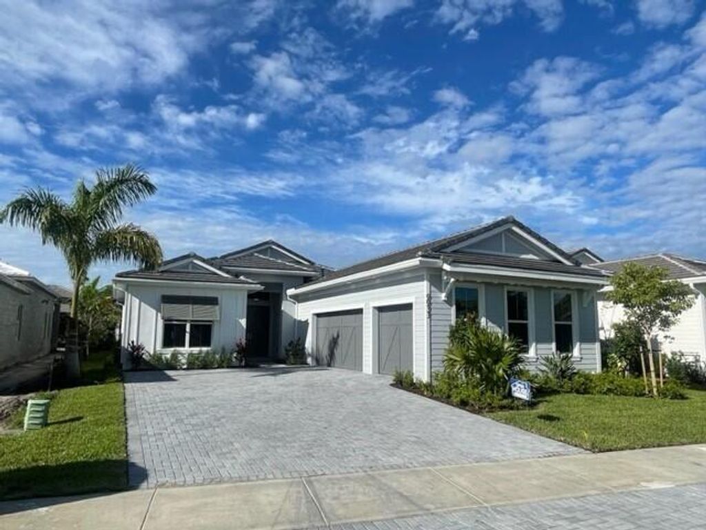 Photo of 9933 Seagrass Way, Palm Beach Gardens, FL 33412 (MLS # R10857205)