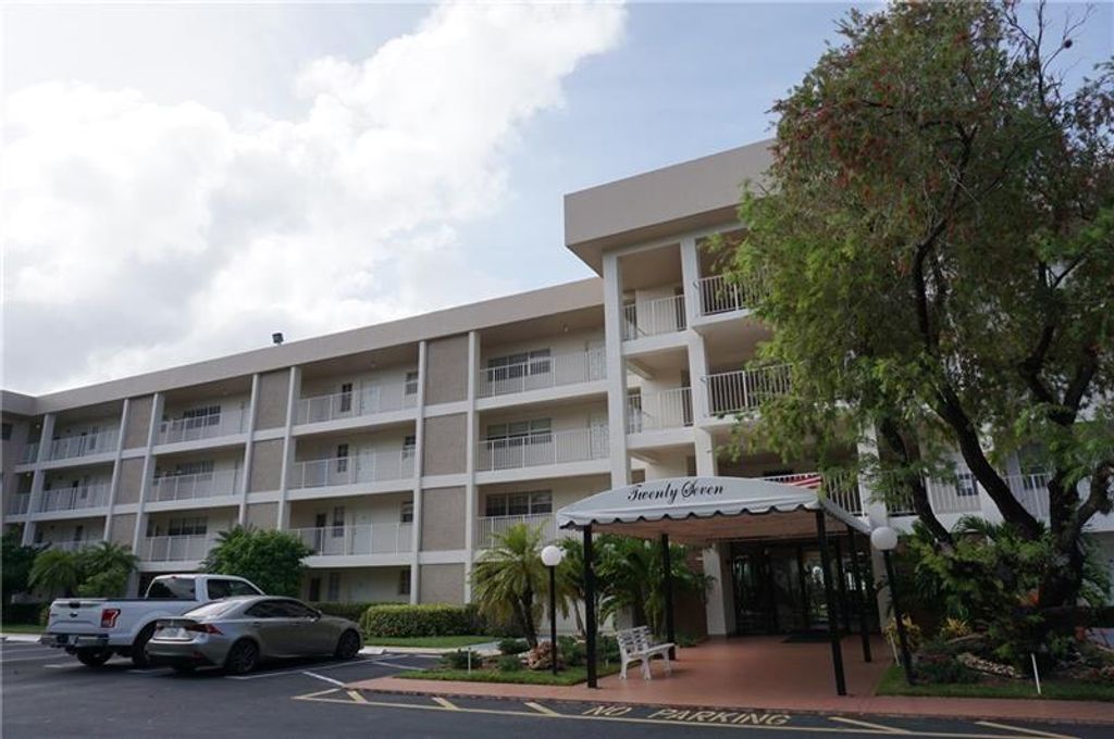 Photo of 2651 S Palm Aire Dr #405, Pompano Beach, FL 33069 (MLS # F10295507)