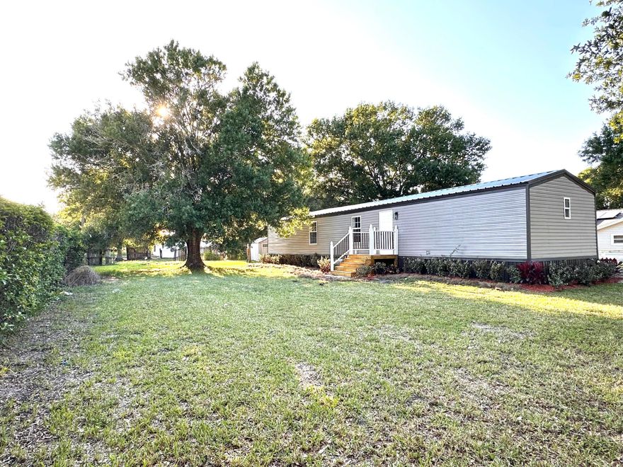 Fully remodeled 2 BR/2BA home built in 2006 on a spacious .34-acre lot! This move in ready property features professional landscaping, new fresh neutral interior and exterior paint, new interior/exterior doors and new drywall with modern texture throughout. New luxury vinyl plank flooring, new recessed lighting, new light fixtures,  new plumbing fixtures, new bathroom mirrors, fixtures and shelving. New kitchen cabinetry with white shaker-style cabinets and new quartz countertops with large breakfast bar perfect for entertaining.  New stainless steel appliances. Home also features a new insulated metal roof with a 25yr Warranty for added value and peace of mind. Stylish, modern, and tastefully renovated from top to bottom! This home feels warm and inviting.  Schedule your showing TODAY!