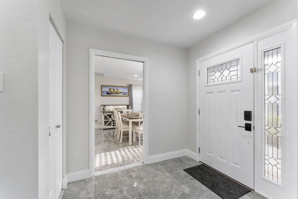 Photo of 8103 COVINGTON Court, Lake Worth, FL 33467 (MLS # B26092350)
