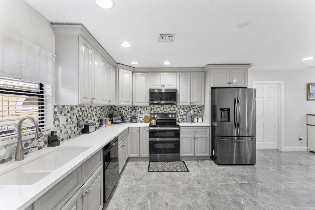 Photo of 8103 COVINGTON Court, Lake Worth, FL 33467 (MLS # B26092350)