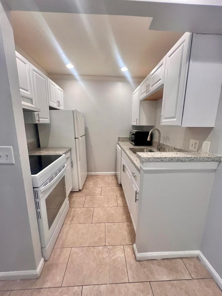FOR RENT-  second floor condo 1bedroom 1bath-Large- Spacious with separate dinning area. Tiles floor through. Corner unit with balcony. Updated kitchen-Granite countertop-  Laundry Facilities. Great community close to I-95. Palm Beach Outlets. No pets allowed by Association. and WATER is included in the rent !