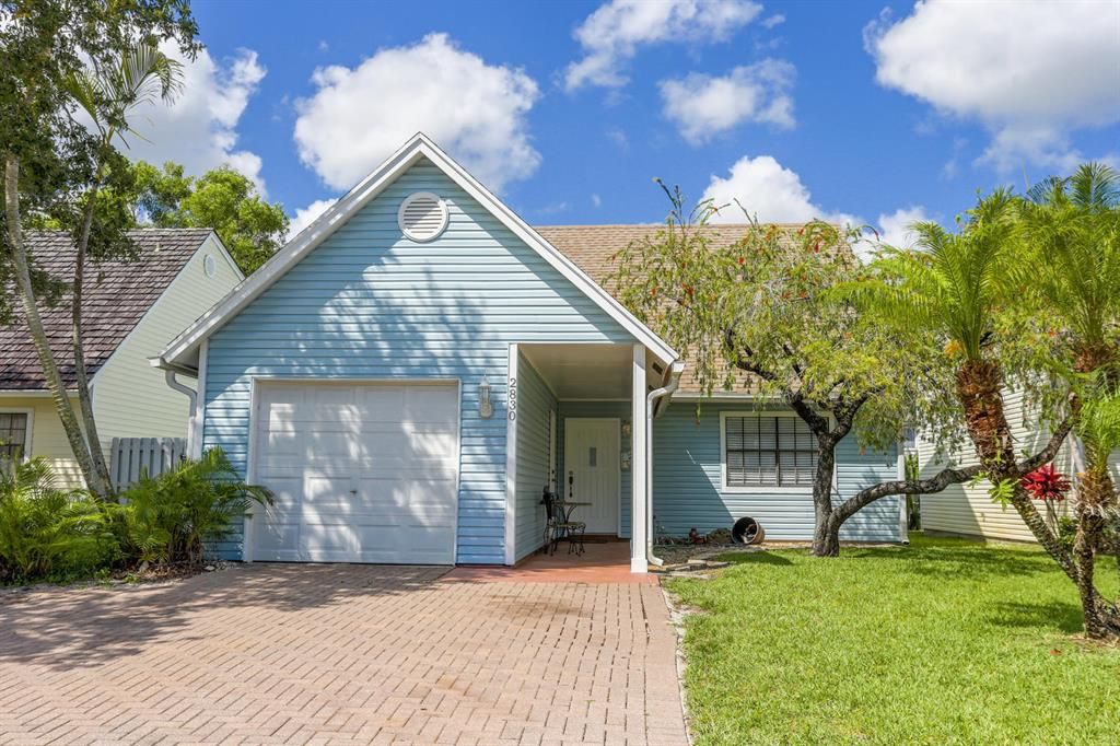 Photo of 2830 Black Pine Court Ct, Lake Worth Beach, FL 33462 (MLS # R10726558)