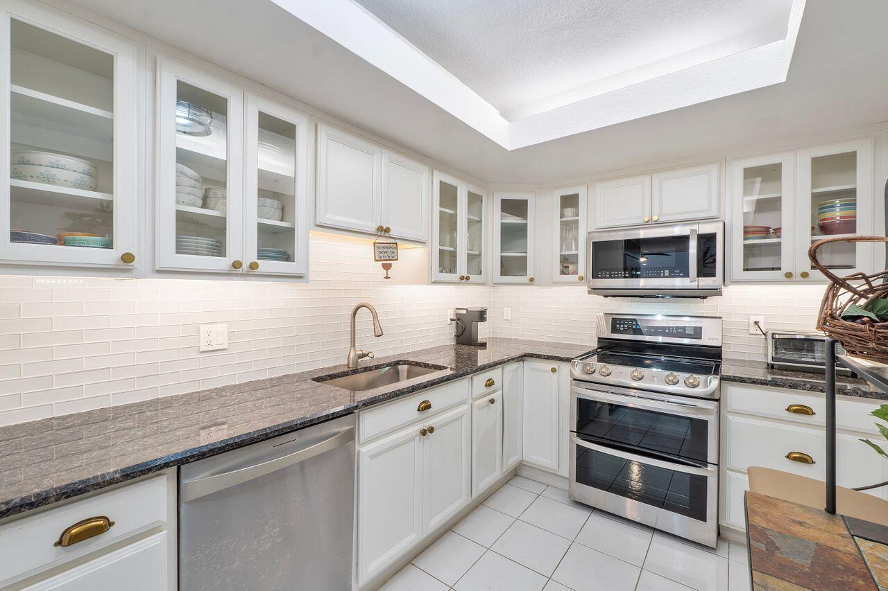 Experience coastal living in this beautifully appointed corner unit, ideally located just a short stroll from the vibrant Deerfield Beach pier, shops, and restaurants. Enjoy stunning ocean views from the living room, bedrooms and balcony. The spacious split floor plan ensures privacy and comfort and is offered fully furnished with tasteful decor and turnkey. The unit is tiled throughout and conveniently includes a washer-dryer. Residents of The Patrician enjoy access to a refreshing pool and a well-equipped fitness center. Whether you're sipping your morning coffee while watching the sunrise over the ocean or enjoying a quick swim at the beach, this home offers a unique blend of convenience and serenity. Don't miss out on this incredible opportunity to live where others vacation!