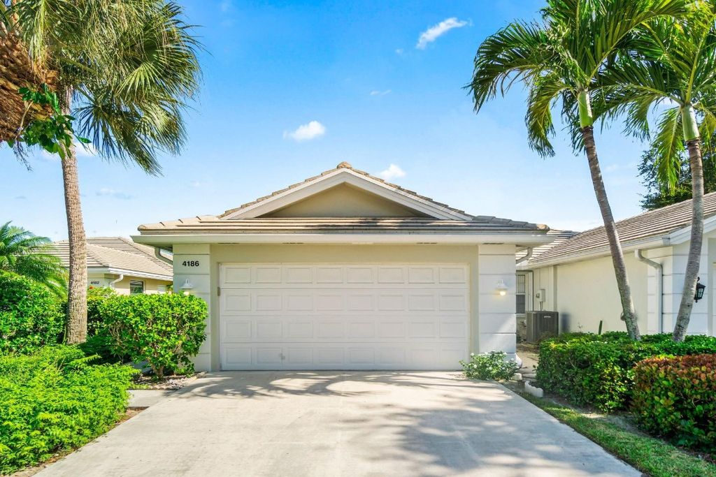 Photo of 4186 Royal Oaks Drive, Palm Beach Gardens, FL 33410 (MLS # F10529970)