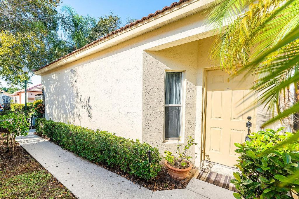 Photo of 2100 Bonisle Circle, Riviera Beach, FL 33418 (MLS # R11148715)