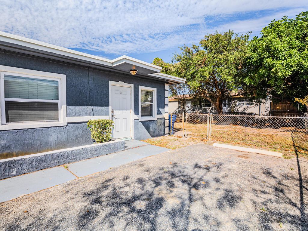 Photo of 112 W 34th Street #1, Riviera Beach, FL 33404 (MLS # B26018354)