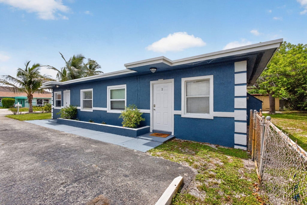 Photo of 112 W 34th Street #1, Riviera Beach, FL 33404 (MLS # B26018354)