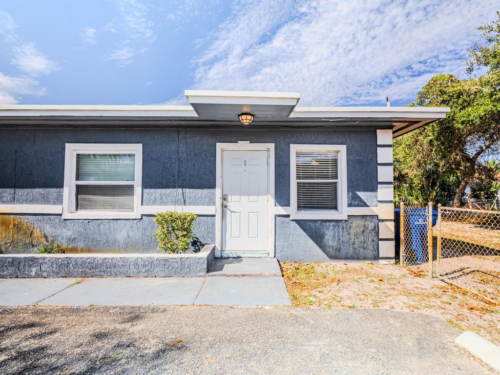 Photo of 112 W 34th Street #1, Riviera Beach, FL 33404 (MLS # B26018354)