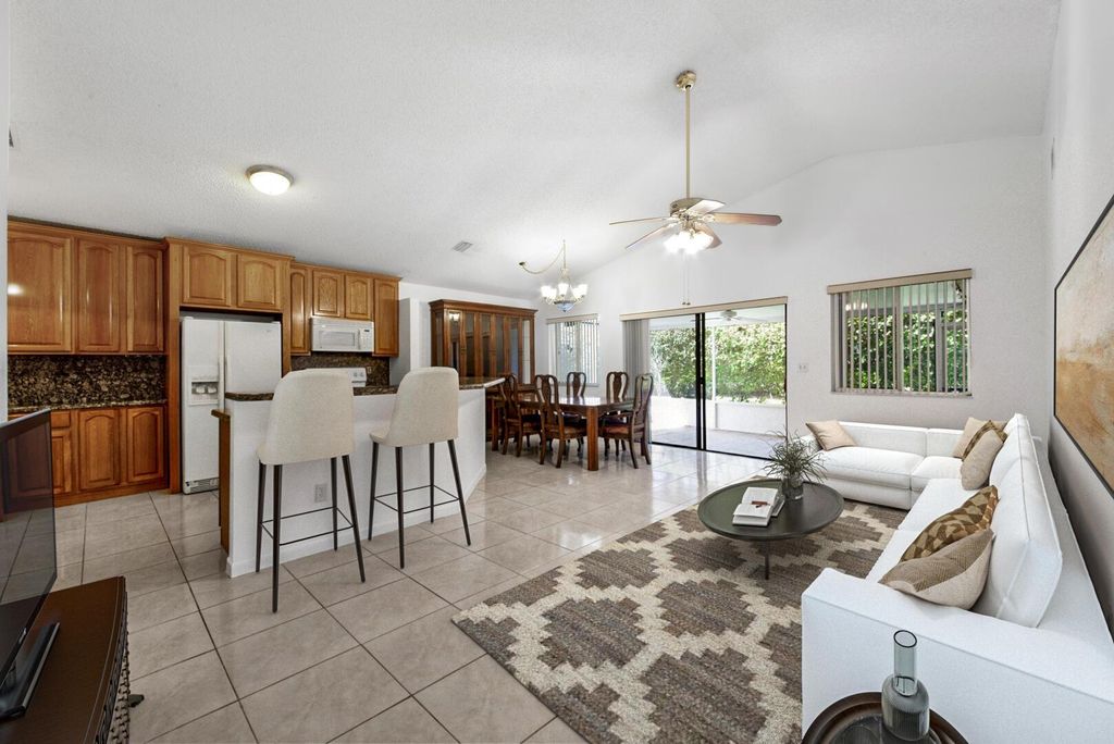 Photo of 25 Hawthorne Lane, Boynton Beach, FL 33426 (MLS # R10968301)