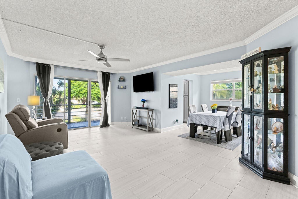 Photo of 3590 Via Poinciana #216, Lake Worth, FL 33467 (MLS # B26080912)