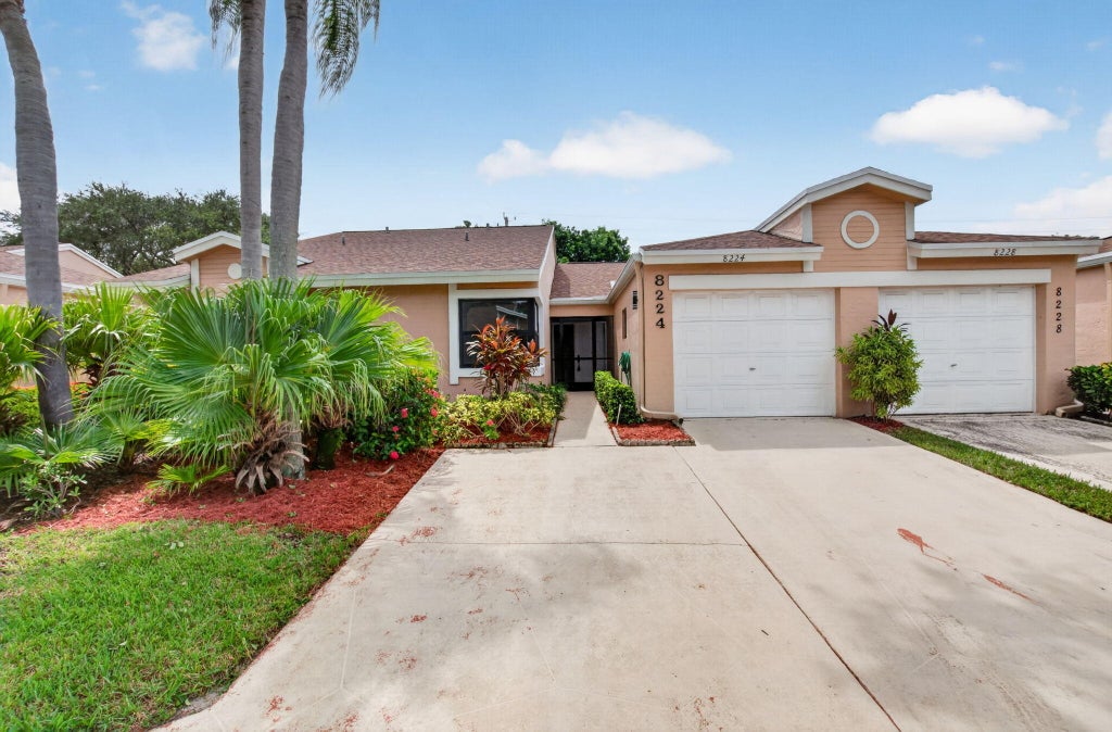 Photo of 8224 SUMMERBREEZE Lane, Boca Raton, FL 33496 (MLS # B26079338)