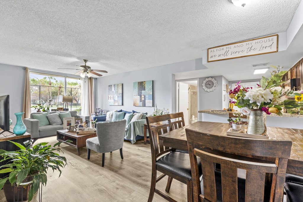 Photo of 10773 Cleary Blvd #106, Plantation, FL 33324 (MLS # B26001147)