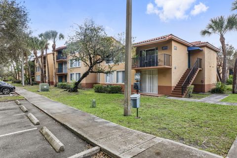 Photo of 10773 Cleary Boulevard #106, Plantation, FL 33324 (MLS # B26001147)