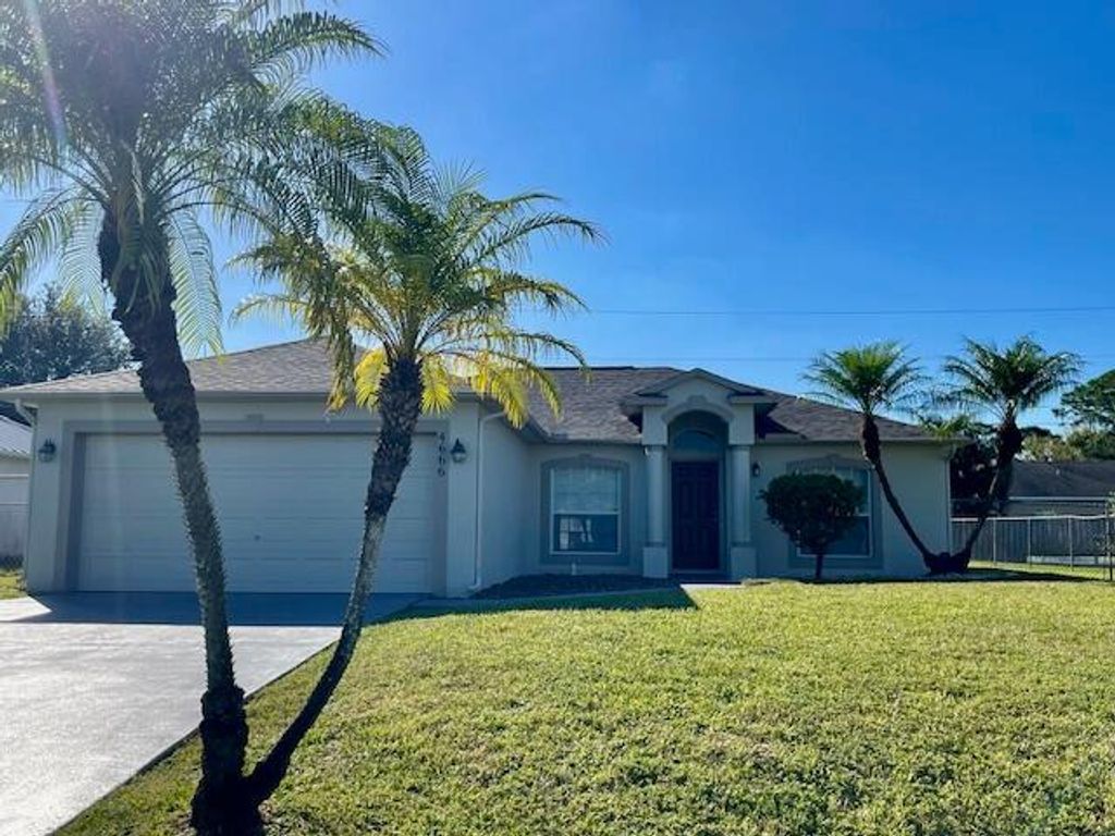 Photo of 4666 SW Pearl Street, Port Saint Lucie, FL 34953 (MLS # R10929432)