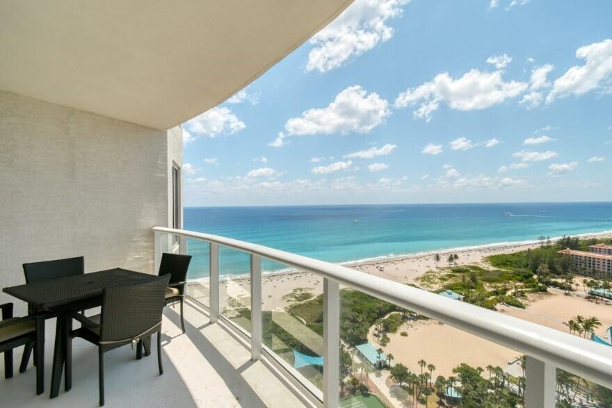 CORNER UNIT WITH UNUBSTRUCTED SPECTACULAR EXPANSIVE VIEWS OF BOTH OCEAN AND INTRA-COASTAL FROM THE 22ND FLOOR. ENJOY SUNRISE AND SUNSET! OPEN CONCEPT GREAT ROOM WITH 9 FT CEILINGS. FLOOR TO CEILING WINDOWS WITH POWERED ROLLER SHADES.RITZ CARLTON RESIDENCE IS DIRECTLY ON THE BEACH, OFFERING 2 POOLS, 2 JACUZZIS ,FABULOUS FITNESS CENTER, THEATER ROOM, POOLSIDE RESTAURANT, VALET AND FULL CONCIERGE SERVICE.