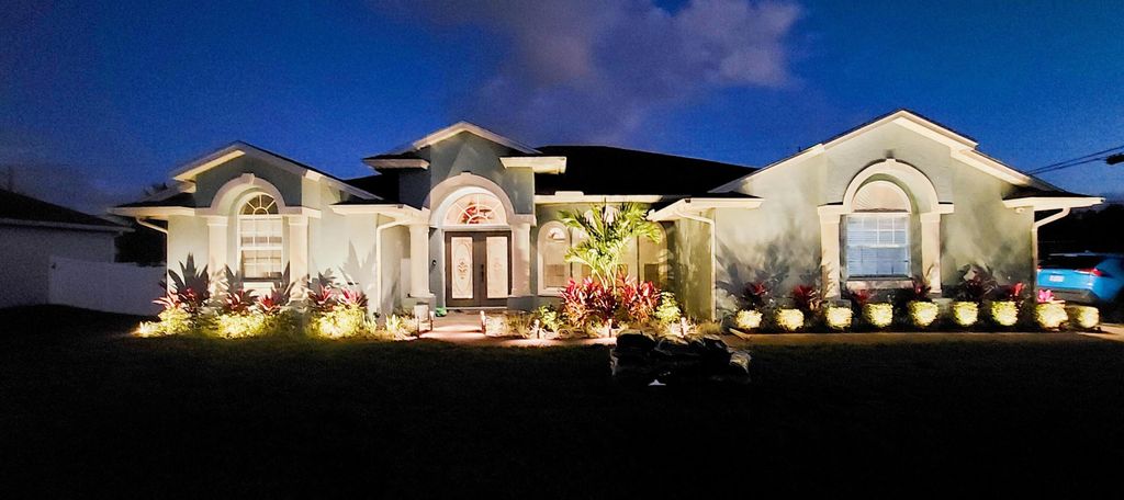 Photo of 1887 SW Hilola Lane, Port Saint Lucie, FL 34953 (MLS # B26004201)