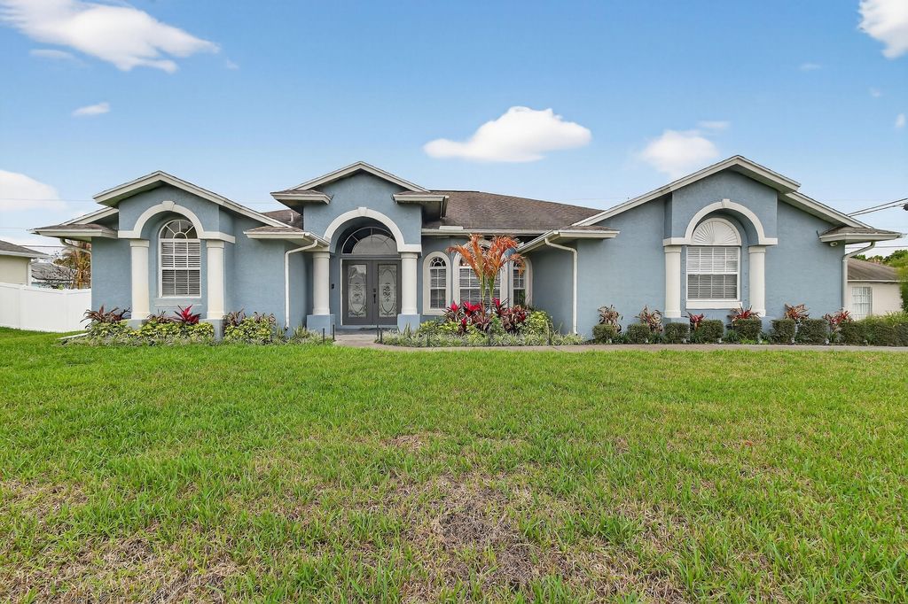 Photo of 1887 SW Hilola Lane, Port Saint Lucie, FL 34953 (MLS # B26004201)