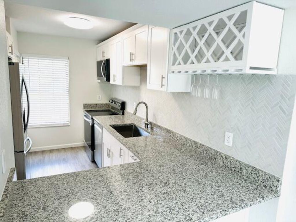 Photo of 1432 SE Colchester Circle, Port Saint Lucie, FL 34952 (MLS # R10990109)