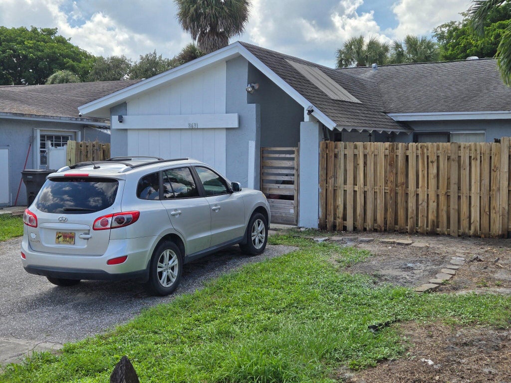 Photo of 8631 Satalite Terrace, West Palm Beach, FL 33403 (MLS # B26082965)