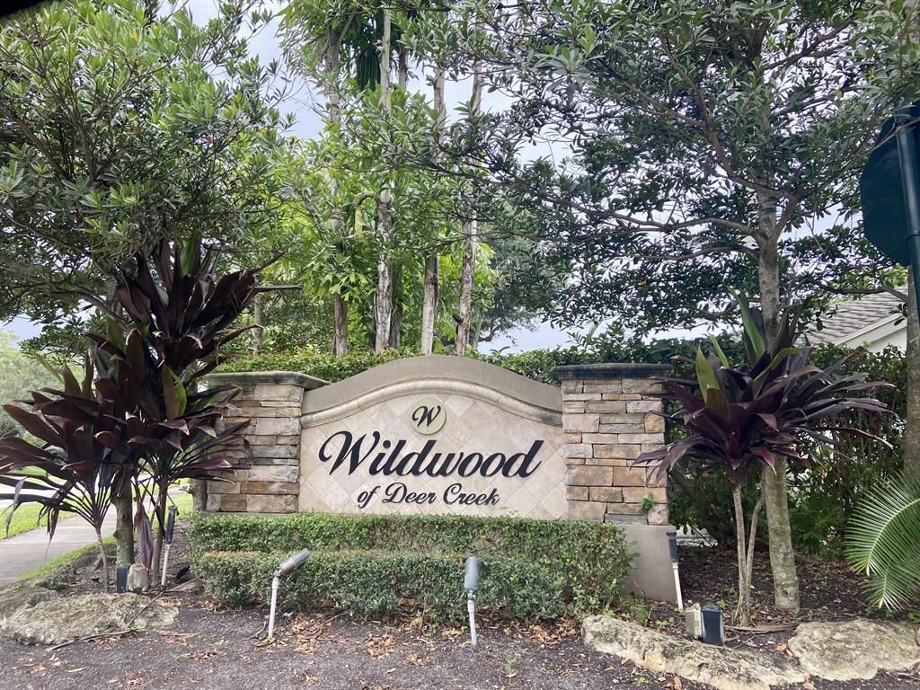 Photo of 456 E Deer Creek Wildwood Ln Lane E, Deerfield Beach, FL 33442 (MLS # B26026291)
