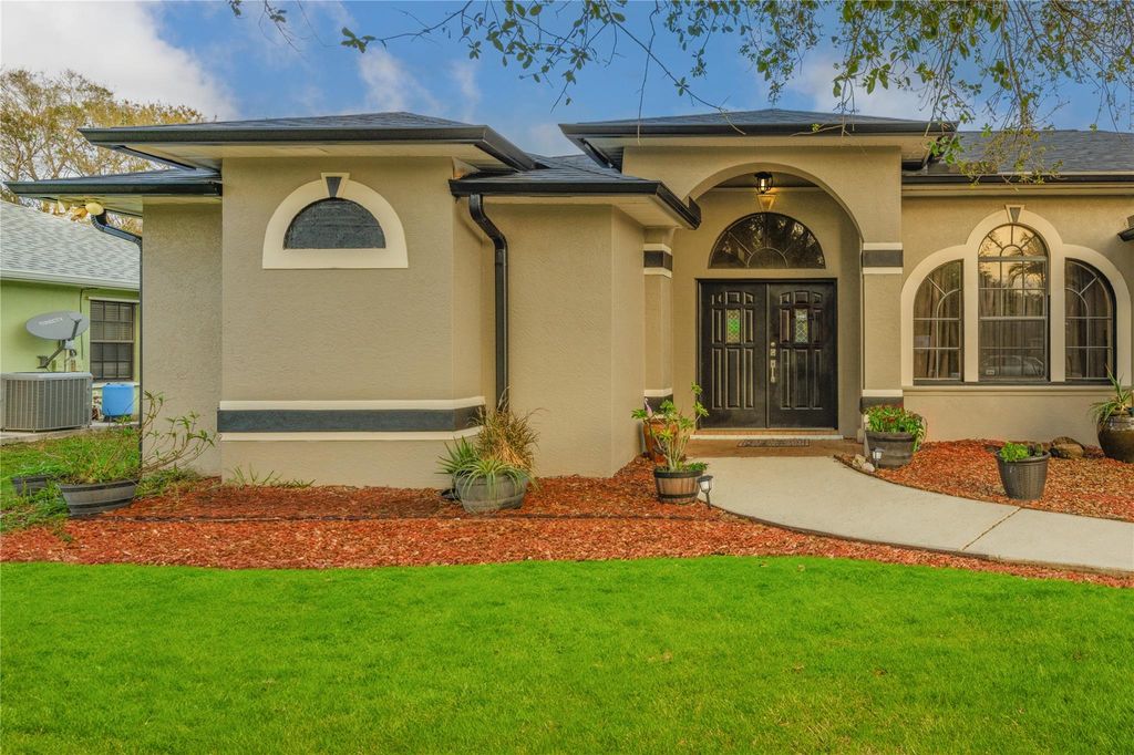 Photo of 2473 SW Mercer Street, Port Saint Lucie, FL 34984 (MLS # F10420450)