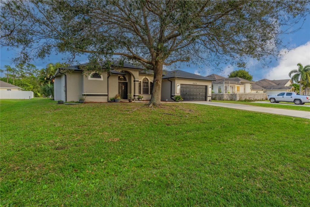 Photo of 2473 SW Mercer Street, Port Saint Lucie, FL 34984 (MLS # F10420450)
