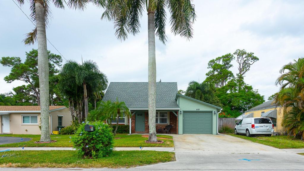 Photo of 459 Broward Avenue, Greenacres, FL 33463 (MLS # R11139328)