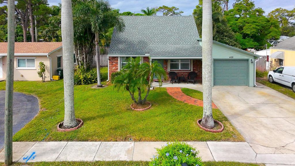 Photo of 459 Broward Avenue, Greenacres, FL 33463 (MLS # R11139328)