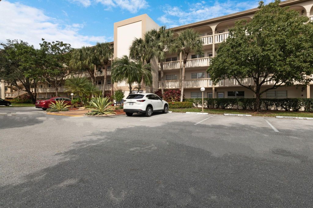 Photo of 4301 Martinique Cir #A2, Coconut Creek, FL 33066 (MLS # F10416522)