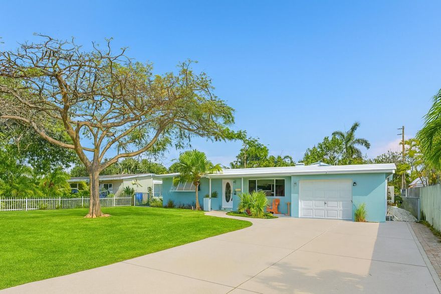 Located on quiet 16th Ave off Atlantic Blvd, this home offers an unbeatable location with walkability to the beach, restaurants, grocery stores, the golf course, and the dog park. The oversized lot features a large driveway for multiple cars, a boat or RV, plus a 1-car garage. The backyard and side yard are manicured with plenty of space for entertaining and include a storage shed. Inside are 2 spacious bedrooms, 2 bathrooms, and an open layout with two living areas and a central kitchen with new stainless steel appliances. A perfect full-time home, vacation spot, or income property.