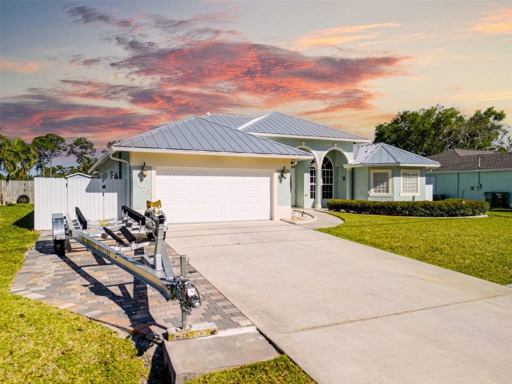 Photo of 3073 SW Ann Arbor Road, Port Saint Lucie, FL 34953 (MLS # F10547920)