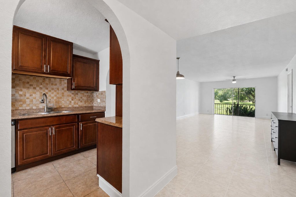 Photo of 6260 S Falls Circle Drive #110, Lauderhill, FL 33319 (MLS # B26073448)