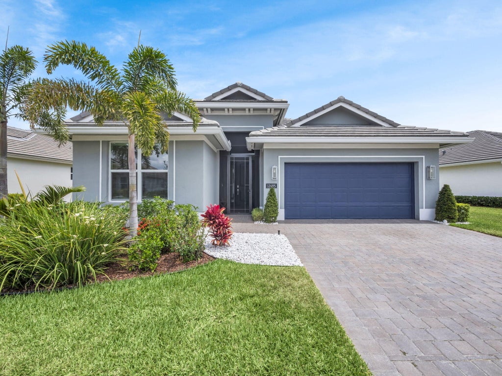 Photo of 12495 SW Sunrise Lake Terrace, Port Saint Lucie, FL 34987 (MLS # R11086546)