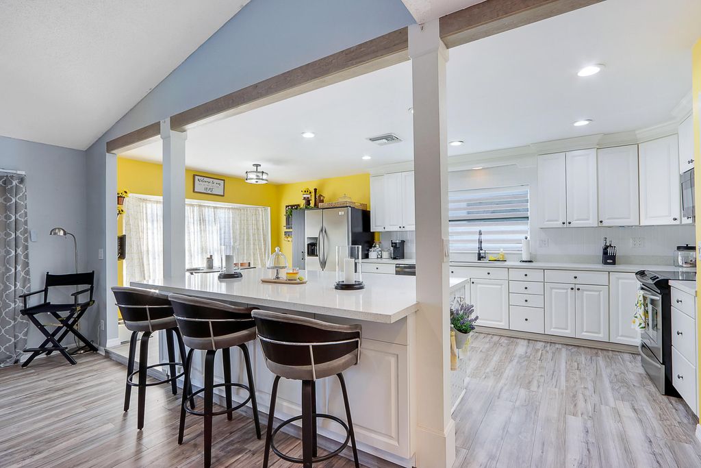 Photo of 108 Timber Run E, Riviera Beach, FL 33407 (MLS # R10868732)