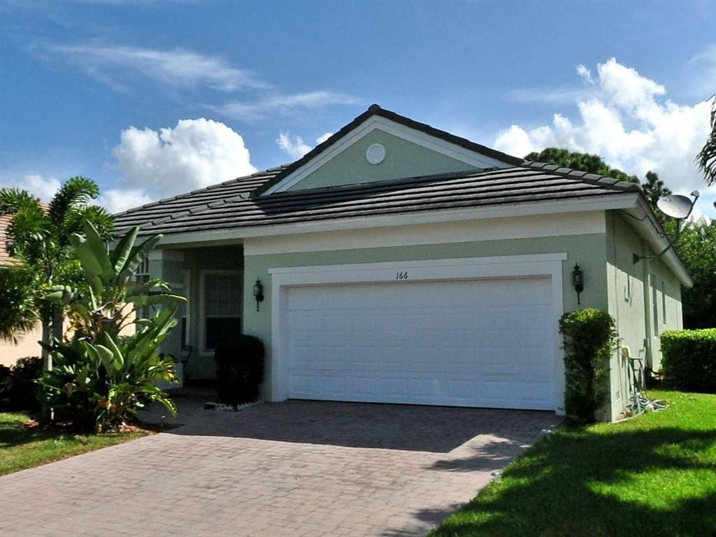 Photo of 166 NW Pleasant Grove Way, Port Saint Lucie, FL 34986 (MLS # R10730996)