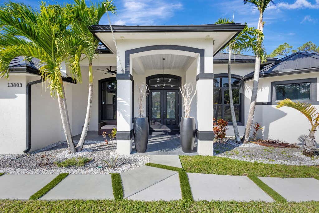Photo of 13803 CITRUS GROVE Boulevard, The Acreage, FL 33412 (MLS # B26058535)
