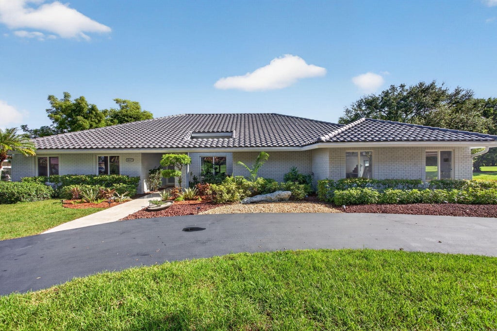 Photo of 10971 NW 24TH Street, Coral Springs, FL 33065 (MLS # B26072228)