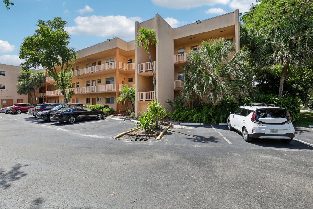 Photo of 8400 LAGOS DE CAMPO Boulevard #303, Tamarac, FL 33321 (MLS # B26088946)
