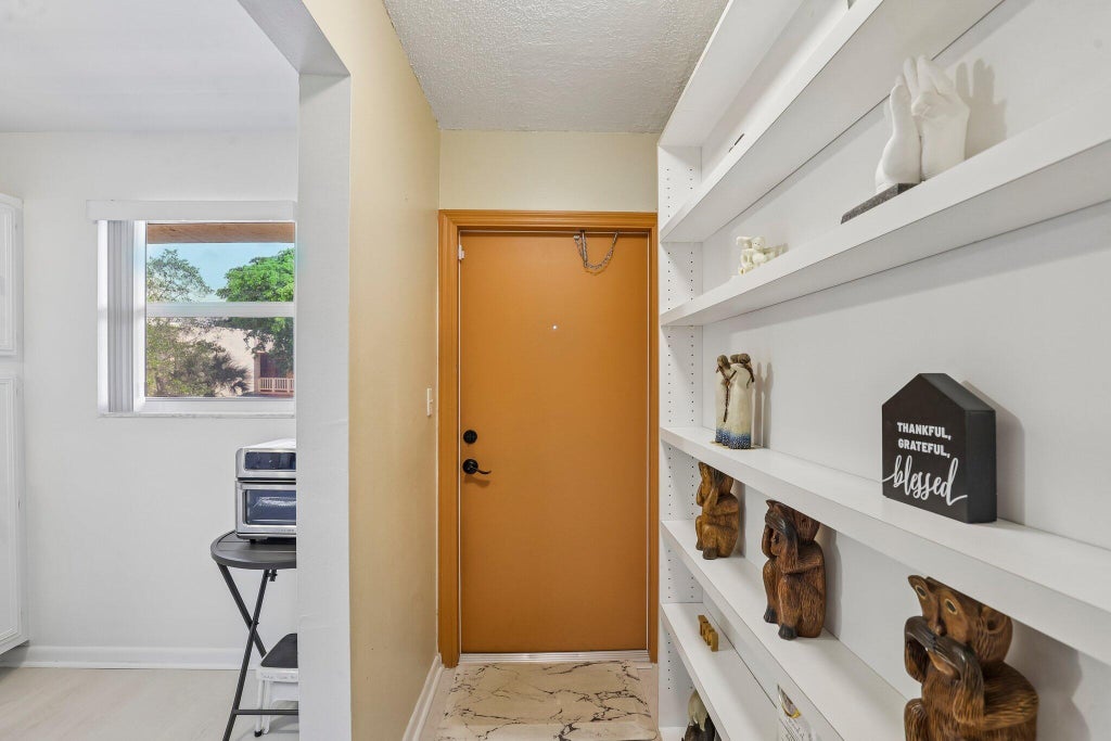 Photo of 8400 LAGOS DE CAMPO Boulevard #303, Tamarac, FL 33321 (MLS # B26088946)