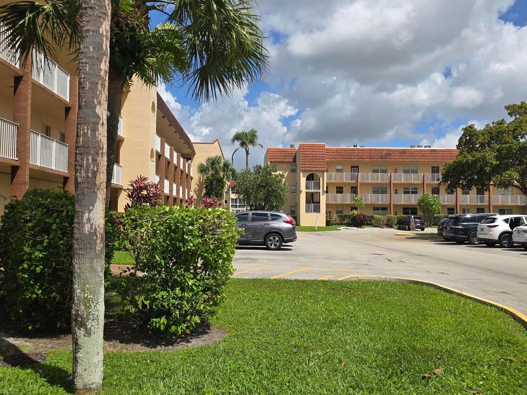 Photo of 2881 N Pine Island Road, Sunrise, FL 33322 (MLS # B26031980)
