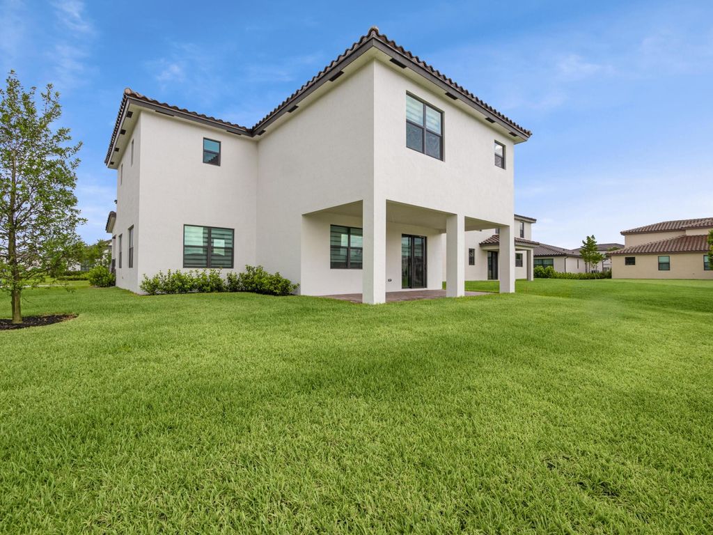 Photo of 1325 Whitcombe Drive, Royal Palm Beach, FL 33411 (MLS # R11167843)