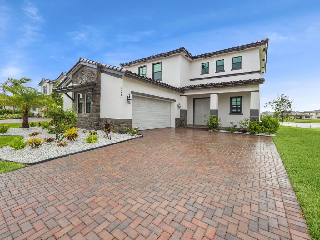 Photo of 1325 Whitcombe Drive, Royal Palm Beach, FL 33411 (MLS # R11167843)