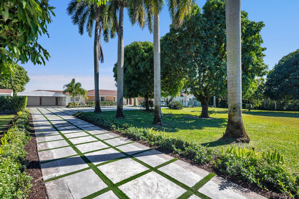 Photo of 7400 W Lake Drive, Lake Clarke Shores, FL 33406 (MLS # R11162371)